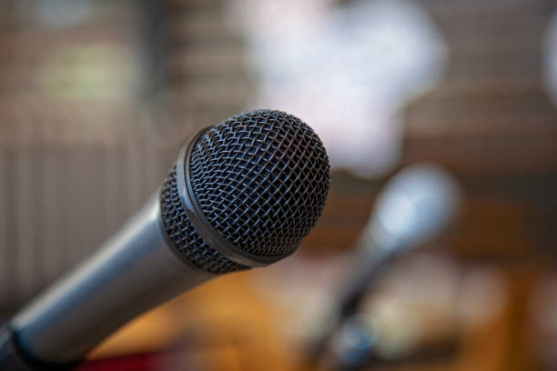 istock Microphones in front stage in a pub bar or restaurant. 1309108983