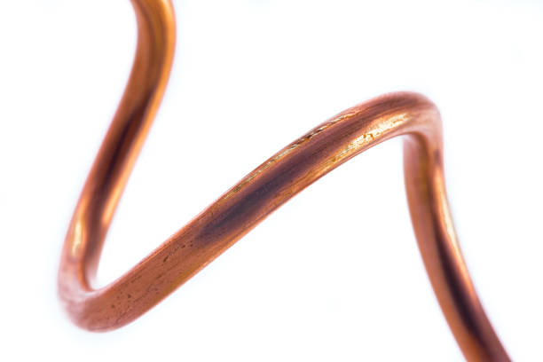 istock Macro of copper wire isolated on white 1309109164