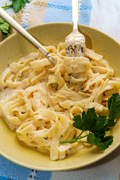 istock Italian Fettuccine Alfredo Dinner 1309109289