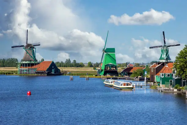 Photo of Row of windmills of the Zaanse Schans in Holland