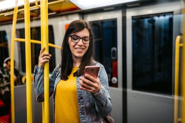 istock Commuter checking social media on phone 1309111886