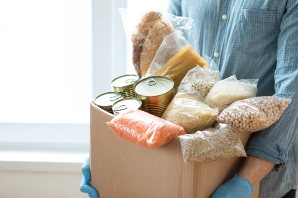 istock Volunteers with donation box 1309111910