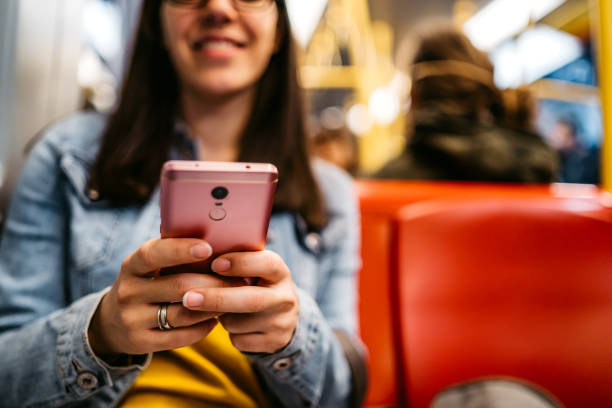 istock Commuter checking social media on phone 1309111951