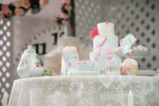 istock Easter tea table: handmade gingerbread cakes in the shape of a hare, toppers, marshmallows. 1309112848