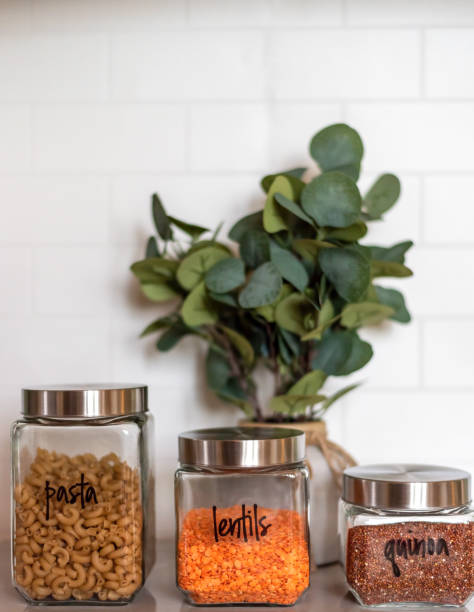 istock Organized stylish kitchen pantry with labeled canisters 1309113059