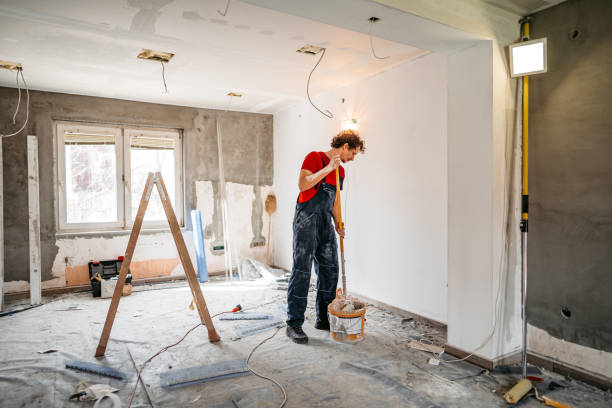 istock Man painting apartment walls 1309113235