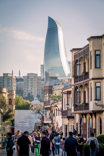 Baku, Azerbaijan: Old part of town with modern Flame Towers in background.