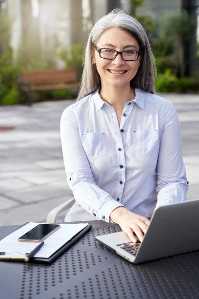 istock Professional lady feeling contented with her freelance job 1309113321