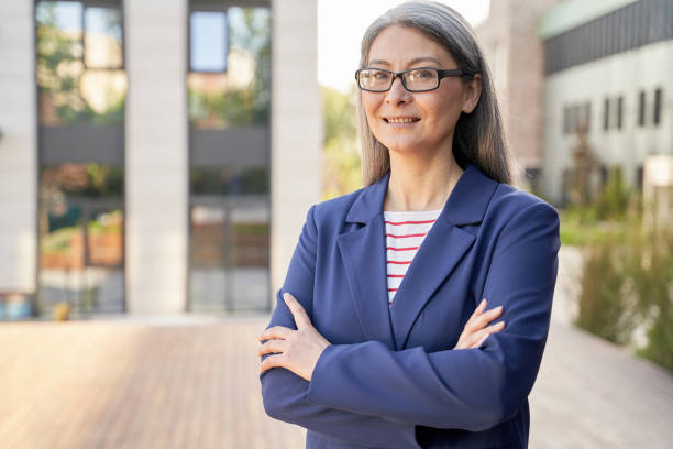 istock Professional lady in classy outfit posing for the camera 1309113336