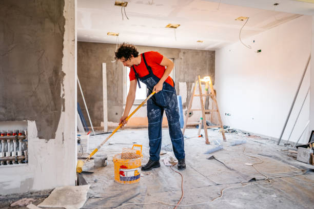 istock Man painting apartment walls 1309113379