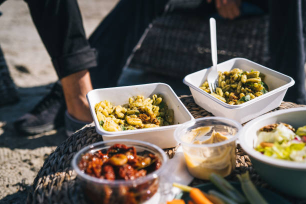 View of vegetarian picnic on beach in the morning