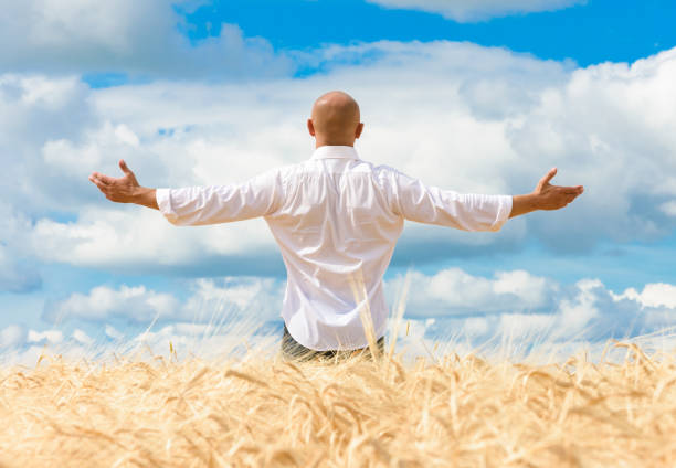 Portrait of a man breathing fresh air in nature