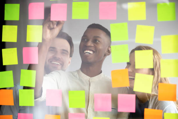 istock Happy young african american male employee organizing working processes. 1309116026