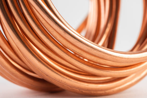 istock Rolled of shiny copper wire with blurred background 1309116330