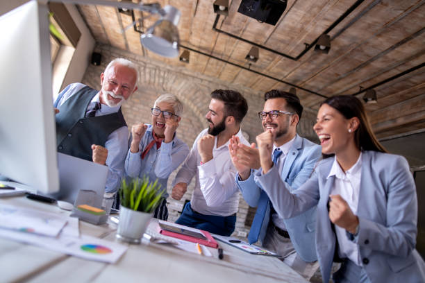 istock Group of business people work together in office 1309118027