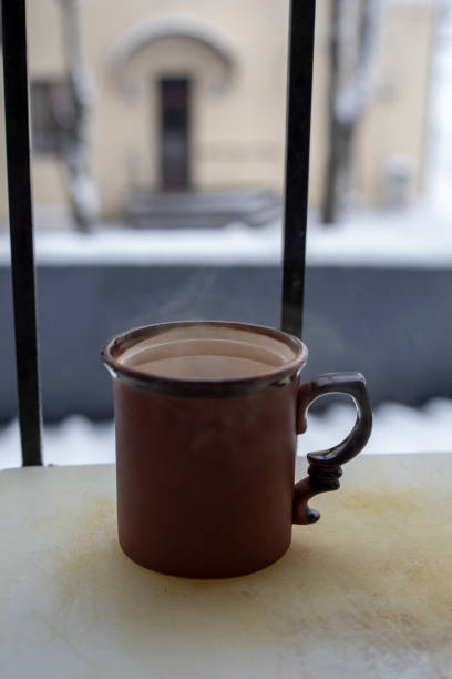 istock ceramic cup with a drink on a quiet near the window, on a winter day, lockdown 1309119550