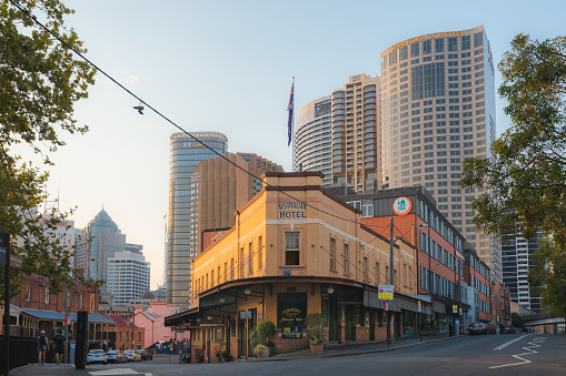 The historic Australian Heritage Hotel in the Rocks, a striking contrast to the Shangri-La behind in Sydney city, NSW, Australia.