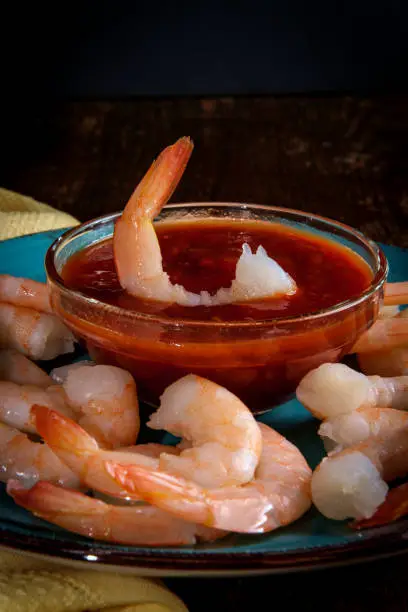 Delightful tail-on shrimp cocktail served with horseradish dipping sauce