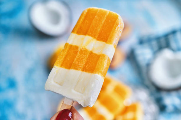 istock Peach Coconut Yogurt Ice Cream on Stick 1309121138