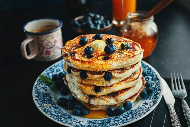 istock Stack of Blueberry Pancakes with Butter 1309121949