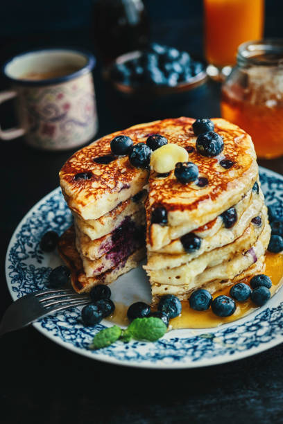 istock Stack of Blueberry Pancakes with Butter 1309121983