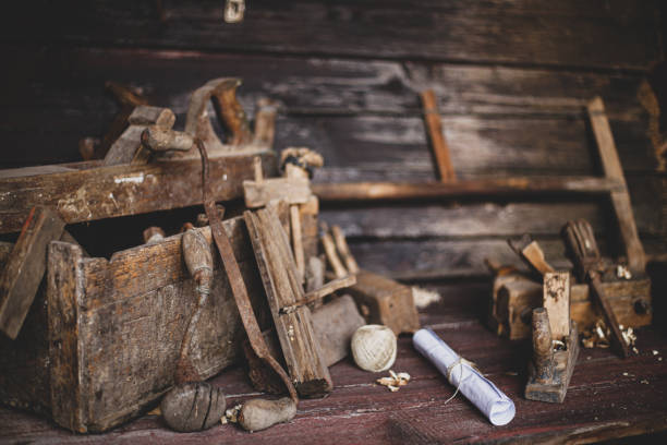 istock Old tool box on table on wood background stock photo 1309122687