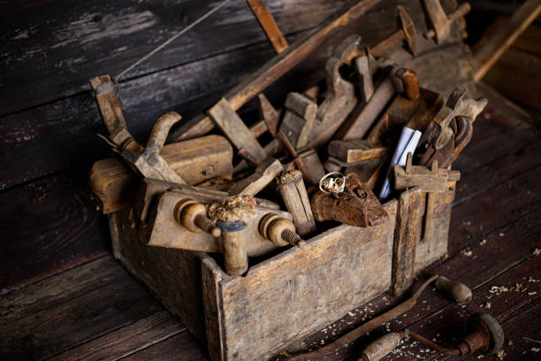 istock Old tool box on table on wood background stock photo 1309124235