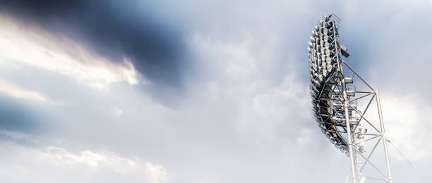 istock Stadium floodlights against cloudy sky 1309124867