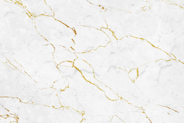 texture blanche de pierre de marbre avec des veines d’or - marbre photos et images de collection