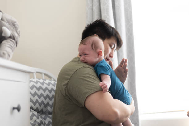 istock Father With Baby 1309131650