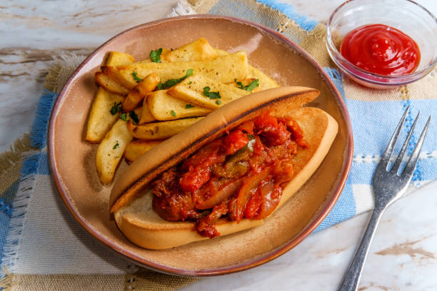 Sausage Onions Peppers Hoagie Sausage onions and peppers hoagie sandwich with side of steak fries torpedo sandwich stock pictures, royalty-free photos & images