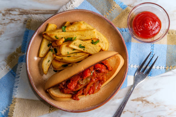 Sausage Onions Peppers Hoagie Sausage onions and peppers hoagie sandwich with side of steak fries torpedo sandwich stock pictures, royalty-free photos & images
