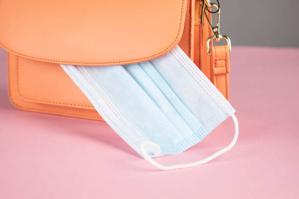 istock bag with medical mask on table 1309133936