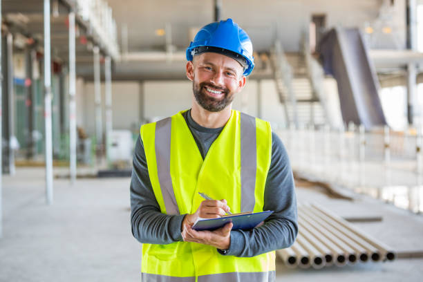 istock Electrician at an indoor construction site 1309134251