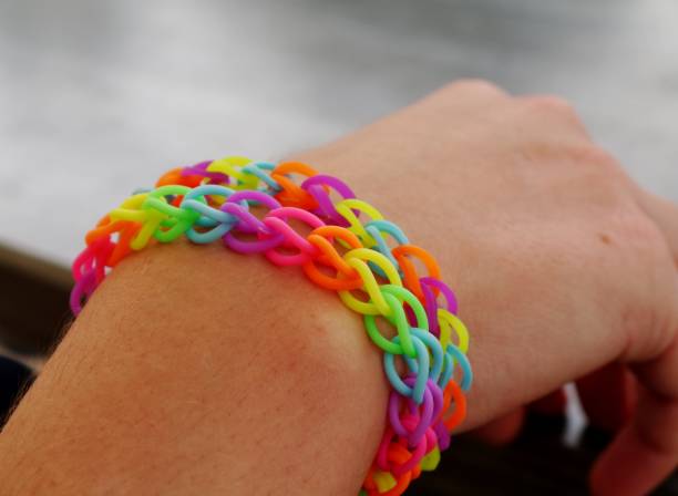 istock Colorful plastic bracelet on the wrist 1309134329