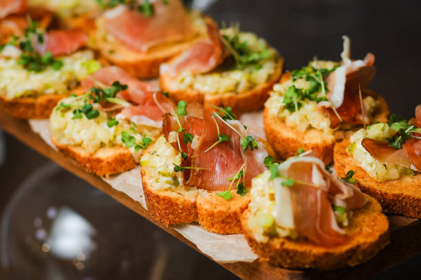istock Catering service. Table with snacks food at event. 1309138172