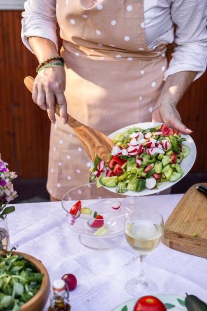 istock Preparing vegetable salad outdoors 1309140291