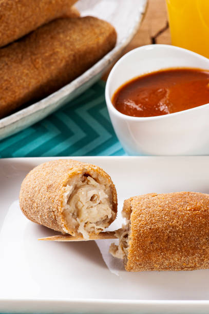 istock Breaded and fried chicken skewer. Typical Brazilian snack 1309140474