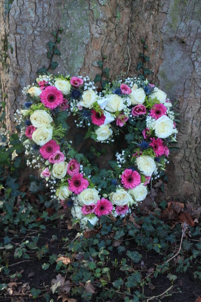 istock Heart shaped sympathy flowers 1309142950