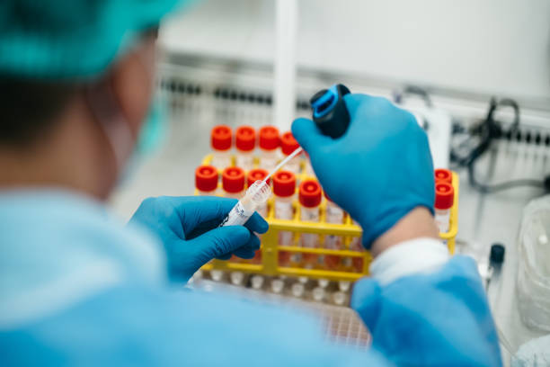 istock The PCR tester takes a sample analysis from a test tube 1309152191
