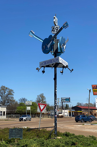 Claksdale, Mississippi - March 20, 2021: Sign for The Blues Crossroads at the intersection of Highways 62 and 49 in Clarksdale, Mississippi..