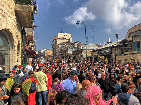 People celebrating Purim during daytime  in Jerusalem, Israel