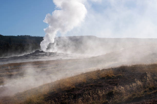 Mineral runoff creating patterns and geological formations from steaming hot springs and geysers Yellowstone national park hot springs and geysers.