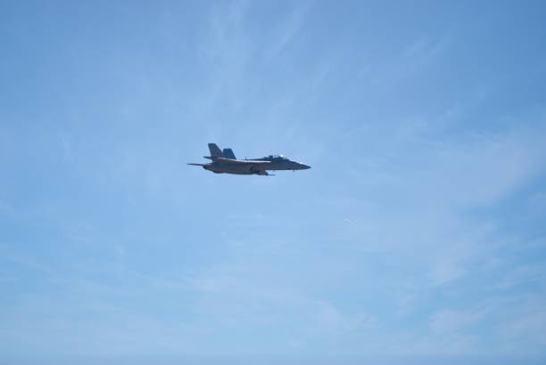 air force fighter plane performing sorties during a training mission - military airplane mcdonnell douglas fa 18 hornet military fighter plane imagens e fotografias de stock