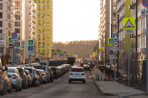 Passage between multi-storey buildings Moscow. Russia. February 2020. All available space is used for parking by installing hundreds of road signs. park designer label stock pictures, royalty-free photos & images