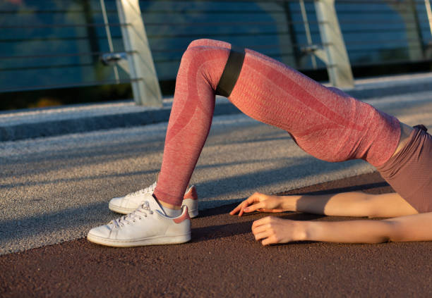 istock Fit woman doing exercises for glutes 1309166635