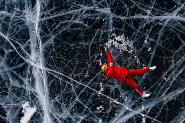 istock woman on  ice  Baikal 1309185928