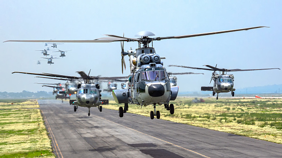 Helicopters and planes in row, military copters and bomber jets and reconnaissance aircrafts, air force, modern army aviation and aerospace industry