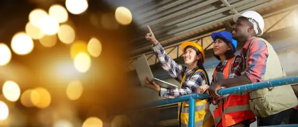 Photo of A group of ethnically diverse engineers in industrial plants.