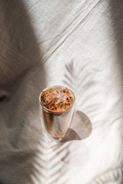 istock Glass of coffee on the table 1309195869